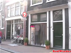 Amsterdam call girl deep-throats customer