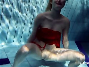 sizzling light-haired Lucie French nubile in the pool